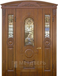 Парадная дверь с коваными элементами №81 - фото